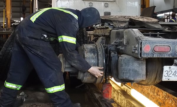 Mechanic working on a trailer